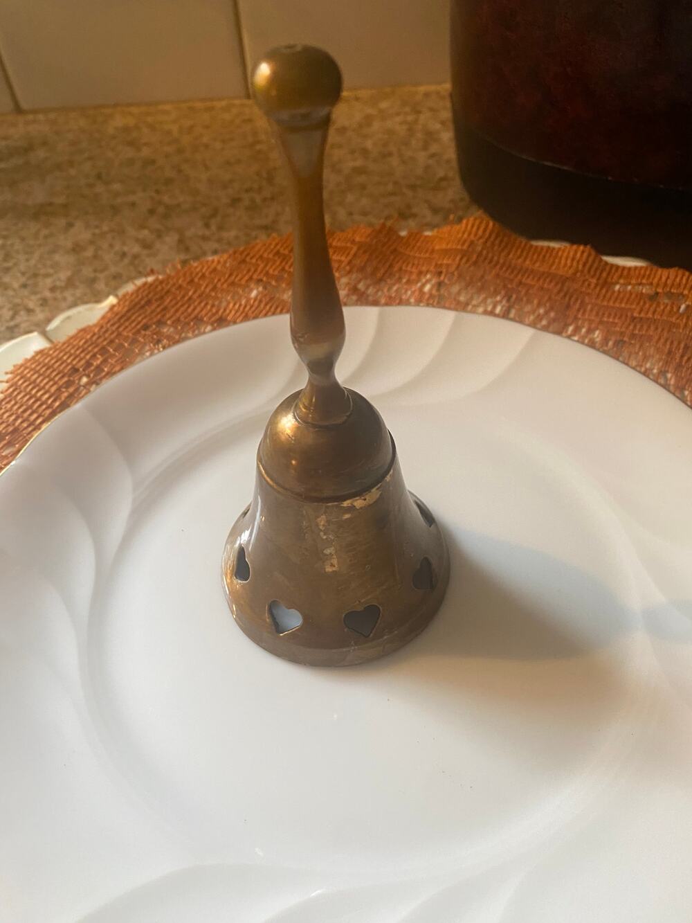 Vintage solid brass bell with hearts